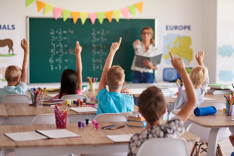 What Awaits Educators in 2021? 2 educators in distance learning