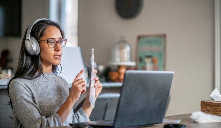11 reasons online learning is better than classroom learning 3 A learner taking online training on a laptop
